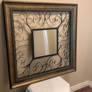 A Beautiful Frame with Iron & Mirror in the middle for Wall